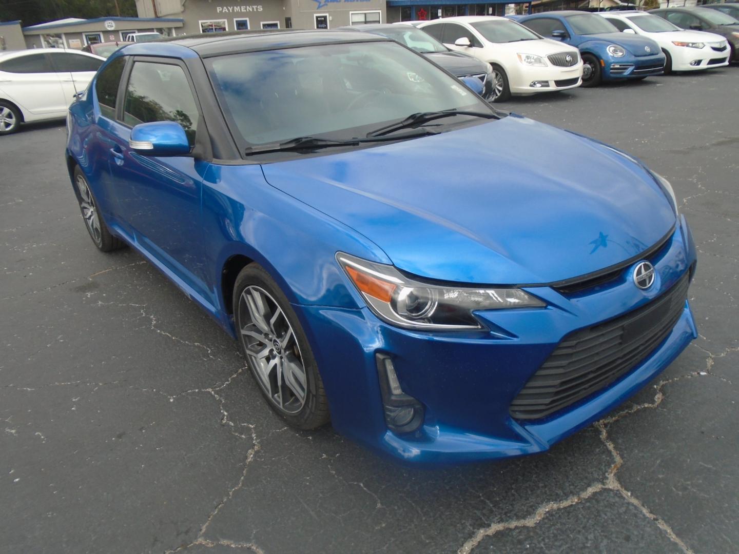 2014 Scion tC Sports Coupe 6-Spd AT (JTKJF5C75E3) with an 2.4L L4 DOHC 16V engine, 6-Speed Automatic transmission, located at 6112 N Florida Avenue, Tampa, FL, 33604, (888) 521-5131, 27.954929, -82.459534 - Photo#2